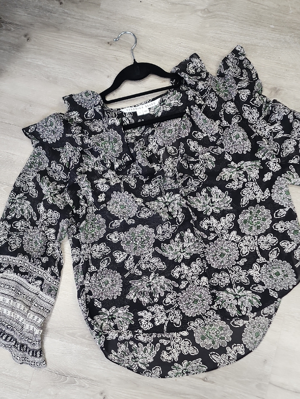Veronica Beard Black Floral Ruffle Shoulder Blouse with Green Accents